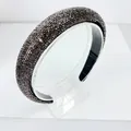 Detailed view of the sparkling dark grey rhinestones on a thick padded wide headband - 2.5cm High Top / Transparent Grey Rhinestone