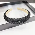 Detailed view of the sparkling black crystal headband with a luxurious padded sponge design - 2.5cm Wide / Black