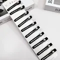 Vue détaillée de 10 barrettes noires ornées de perles et de strass brillants sur carte - Carte Longue Jingxin Avec 10 Perles Strass Enveloppées Dans Du Tissu [pince À Bec Carrée Min]