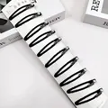 Lot de 10 barrettes noires avec perles argentées et strass sur carte de présentation - Style Mini Strass Perle de Carte Longue Enveloppé de Tissu