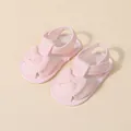 Rosa Baby-Sandalen aus Spitze mit Schleife und rutschfester, weicher Gummisohle - Innenlänge 12.5cm / Hellrosa