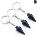 Dreiteiliges Set kegelförmiger Blaufluss-Kristall-Schlüsselanhänger mit silbernen Ringen - Blausandstein (Synthetisch)