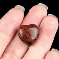 Handheld mahogany obsidian heart stone with polished finish and natural red-black veins - Mahogany Obsidian