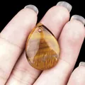 Handcrafted teardrop Tiger Eye gemstone pendant with natural golden brown layered textures - Tiger's Eye
