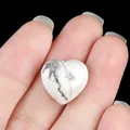 Polished white howlite stone in heart shape with natural grey marble veining - Howlite