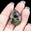 Polished Kambaba Jasper teardrop pendant with natural green and black patterns - Rhyolite