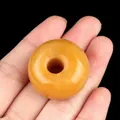 Natural orange agate 30mm abacus bead with a smooth polished finish and cloudy texture - Topaz