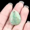 Teardrop shaped natural amazonite stone pendant with smooth pale green texture - Amazonite