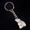 Carved natural agate frog bird keychain with white and grey marble texture on black background - White Crazy Lace Agate