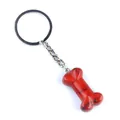 Porte-clés pendentif os en pierre de marbre rouge poli avec anneau en métal argenté - Jaspe Rouge