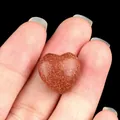 Polished goldstone heart shaped stone with sparkling metallic gold flecks on brown base - Gold Sand Stone (Synthetic)
