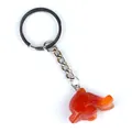 Carved red agate dolphin keychain with silver metal ring and natural stone texture - Red Agate