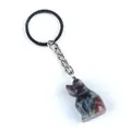 Dog-shaped keychain with natural agate stone carving on a silver metal ring - India Agate