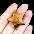 Star-shaped tiger eye stone carving with a smiling face for DIY accessory or decor - Tiger's Eye