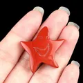 Red jasper carved smiling star natural crystal stone accessory held in hand - Red Jasper