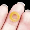 Natural yellow agate ring pendant bead with bright orange finish and stone texture - 10mm / Yellow Jade