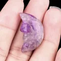 Purple and white carved natural crystal crescent moon stone with human face profile - Amethyst