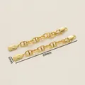 Detailed view of 18K gold-plated extension chain with oval links and Queen pendant - 5x69mm