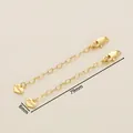 Detail of 18K gold plated heart-shaped extender chain with lobster clasp and Love pendant - 8x79mm