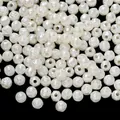 Detailed macro view of white ABS resin rose flower beads with glossy finish for DIY jewelry - 6mm (200 Pcs/Pack) / Off White