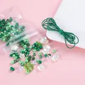 Kit gioielli DIY con perline acriliche verdi, quadrifoglio e cordino per braccialetti - Sistema Verde