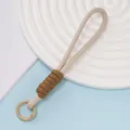 Laccetto per cellulare intrecciato con cordino bianco panna e dettagli marroni - Stile Cuciture Beige Marrone (Stile 10)