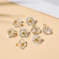 Eight clear glass flower pendants with gold centers for DIY jewelry making - 10x10mm / Clear