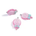 Ciondoli a lecca-lecca in resina rosa con spirali bianche e fiocchi blu per fai da te - Lecca-lecca rosa
