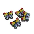 Set de cuatro dijes de mariposa arcoíris de PVC para manualidades y decoración DIY - Multicolor