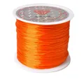 Vue détaillée du fil élastique orange robuste sur bobine pour création de bijoux DIY - 0.1mm*40m / Orange