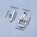 Antik versilberter Knebelverschluss aus Zinklegierung für DIY-Armbänder mit Maßen - Leopardenprint / 10 Sets
