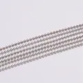 Macro shot of silver ball chain strands for jewelry making with polished metal finish - Style 1 / Rhodium