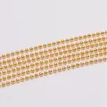 Macro shot of gold-plated metal bead chain for DIY jewelry making and necklaces - Style 1 / Gold