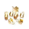 Close-up of golden U-shaped jewelry crimp ends with textured finish for DIY crafting - 3*6mm / Gold