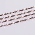 Macro detail of bronze metal O-shape chains for DIY jewelry making accessories - Antique Red Copper