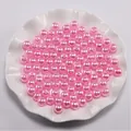 Macro-opname van glanzende roze ABS-parels in een decoratieve schaal voor DIY-sieraden - 3mm (400 Stuks/Pak) / Roze