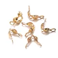 Golden clamshell bead tips for DIY jewelry making with polished metallic finish - 4x7mm / KC Gold