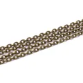 Macro detail of antique bronze flat cross chain links for DIY jewelry and necklaces - 2x3mm (5 Meters) / Antique Bronze