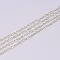 Close-up of polished silver cross link chain for DIY jewelry making and necklace crafts - 2x3mm (5 Meters) / Silver