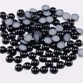 Detailed view of glossy black flatback ABS imitation pearls for DIY crafts and nail art - 2mm (10000 Pieces/Pack) / Black