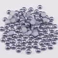 Macro shot of half round ABS faux pearls with metallic grey-purple sheen and flat back - Dark Gray