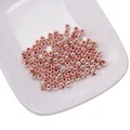 Perline tonde in metallo oro rosa lucido per la creazione di gioielli fai da te - Oro rosa