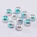Ten pieces of spherical ABS faux pearls with colorful blue and pink gradient pearl coating - Blue White
