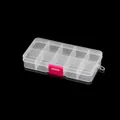Dettaglio di un organizer per gioielli in plastica a 10 scomparti con chiusura rosa - Multi-scomparto / Bianco con chiusura rosa