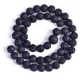 Macro detail of natural black lava stone beads with porous texture for DIY jewelry making - 6mm Style (ST0042) / Black