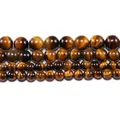 Macro detail of natural tiger eye stone beads in four sizes for DIY jewelry making - US 4 / Yellow Tiger Eye