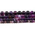 Purple striped agate round beads with natural banded patterns in various sizes - Purple