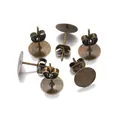 Macro view of bronze DIY earring posts with flat base and butterfly backs set - X-Small Style / Antique Bronze