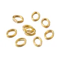 Detail of golden oval open jump rings for DIY jewelry making and necklace assembly - 4*3mm (300 Pcs/Pack) / Gold