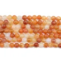 Strand of orange red dragon vein agate beads showing natural cracked patterns and gradients - 6mm / Dragon Vein Agate